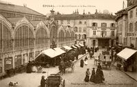 Le Marché Couvert et la Rue D'Arches